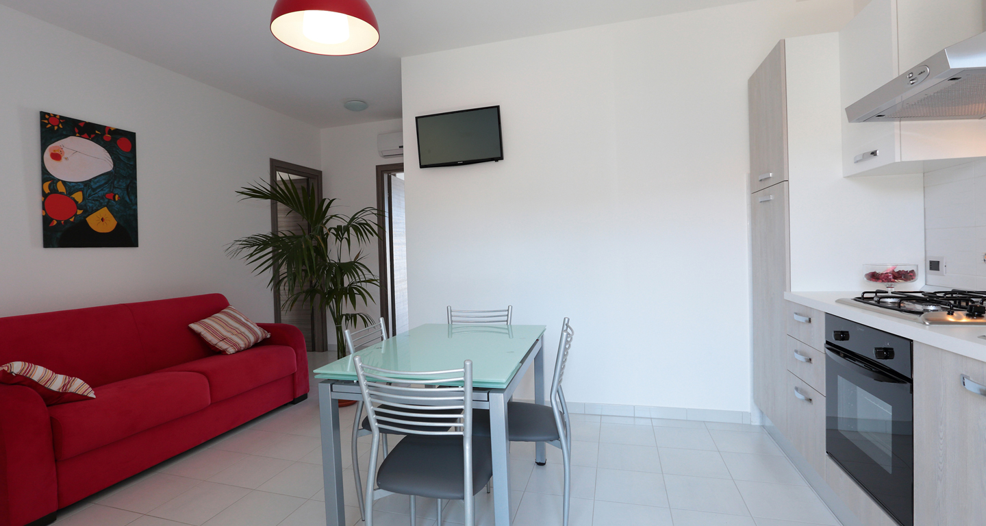 Cunina soggiorno con divano letto